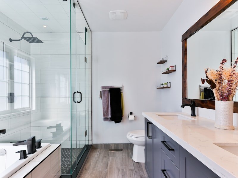 Modern bathroom vanity with a white quartz countertop and integrated undermount sinks